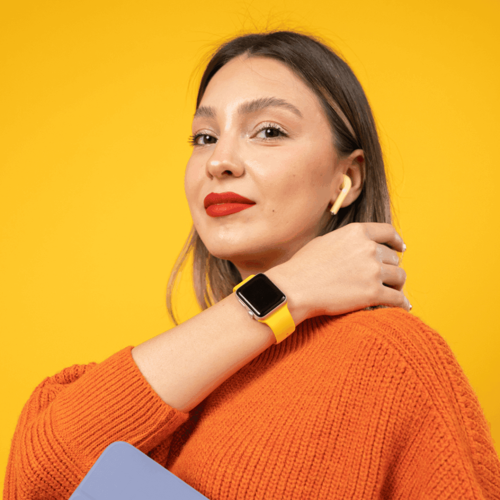 Confident tech savvy executive assistant with a smart watch and tablet